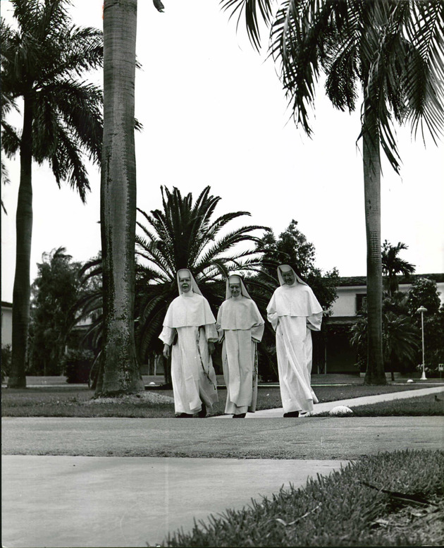 Mother Genevieve Weber and Sisters Mary Alice and Benedicta Marie walk the campus on Founders' Day 1962